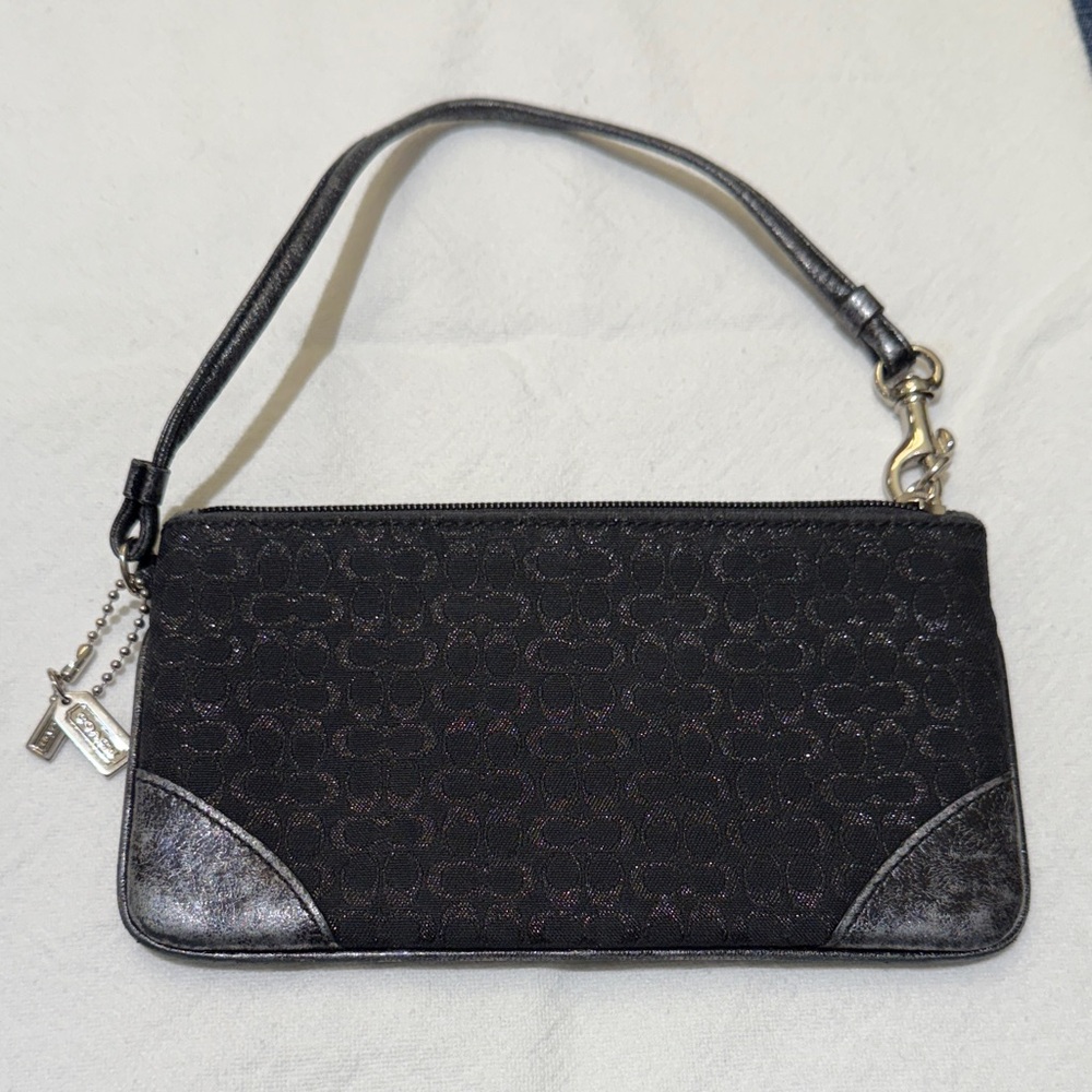 Coach Black Signature Wristlet with double mini metal hangtags.